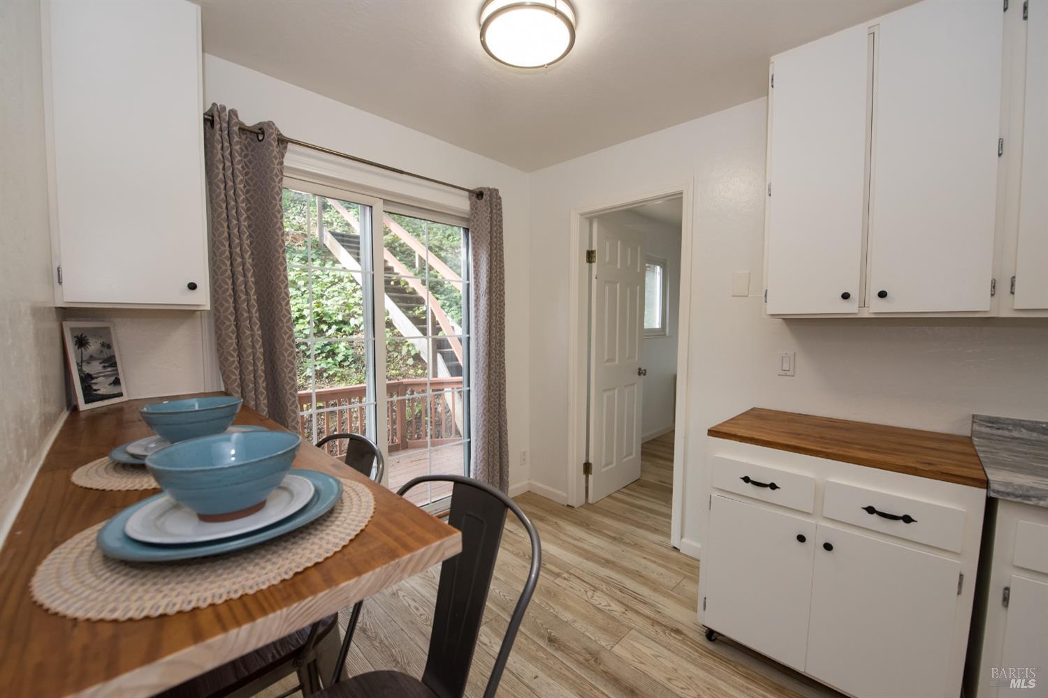 8650 Mirabel Road Forestville, CA 95436 - Photo 10 of 42 a kitchen with a table and chairs