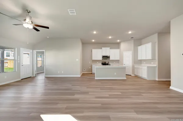 a view of kitchen with wooden floor