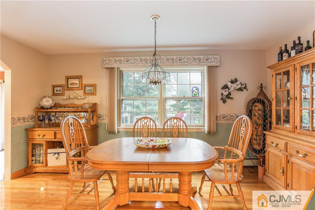 190 Normandy Road Edison, NJ 08820 - Photo 7 of 25 a dining room with furniture and window