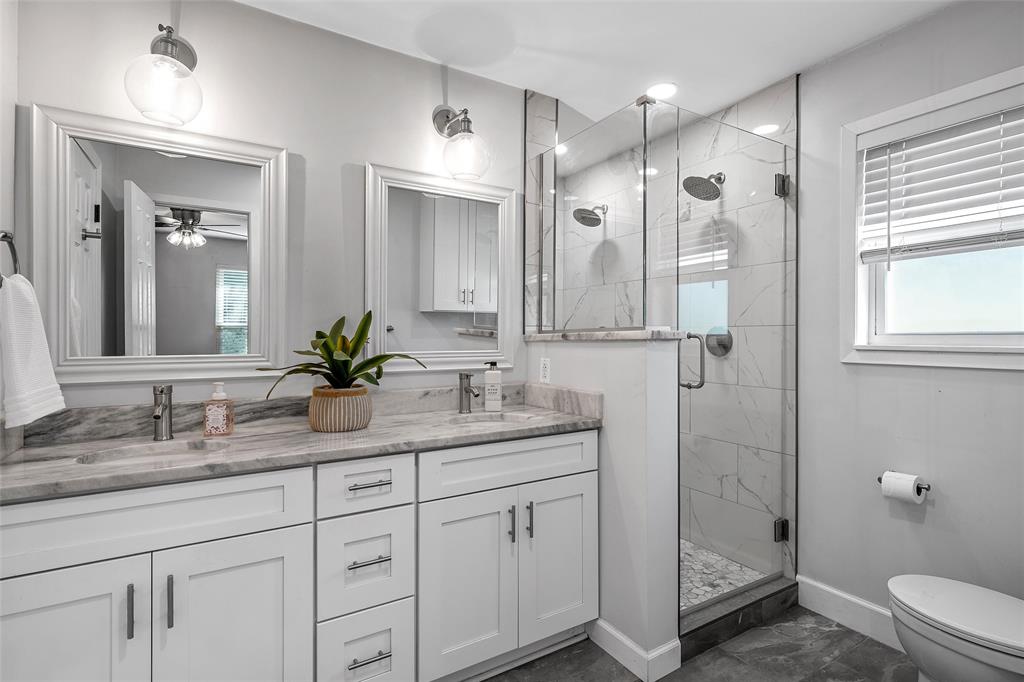 212 North Old Temple Road Hewitt, TX 76643 - Photo 15 of 40 ensuite primary bathroom with oversized tiled shower