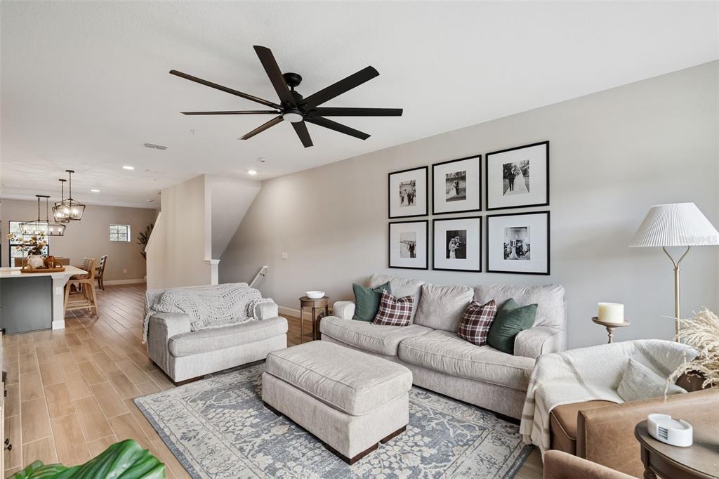 1230 Spotted Sandpiper Loop Winter Springs, FL 32708 - Photo 12 of 52 a living room with furniture and a couch
