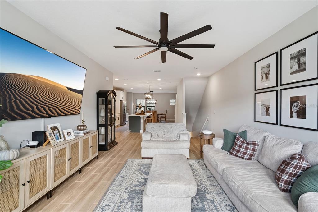 1230 Spotted Sandpiper Loop Winter Springs, FL 32708 - Photo 14 of 52 a living room with furniture and kitchen view