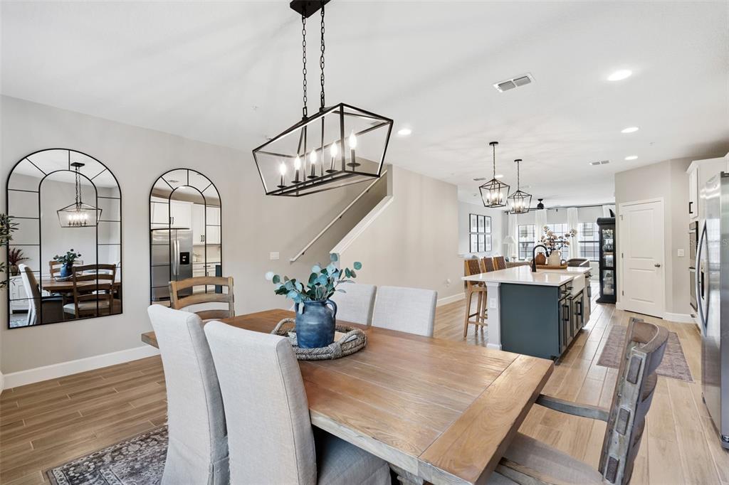 1230 Spotted Sandpiper Loop Winter Springs, FL 32708 - Photo 21 of 52 a view of a dining room with furniture window and wooden floor