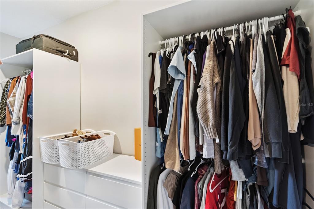 1230 Spotted Sandpiper Loop Winter Springs, FL 32708 - Photo 32 of 52 a view of walk in closet with clothes and shoes