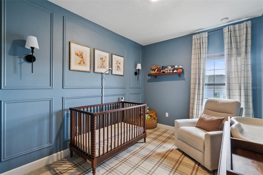 1230 Spotted Sandpiper Loop Winter Springs, FL 32708 - Photo 33 of 52 a bedroom with furniture and a window