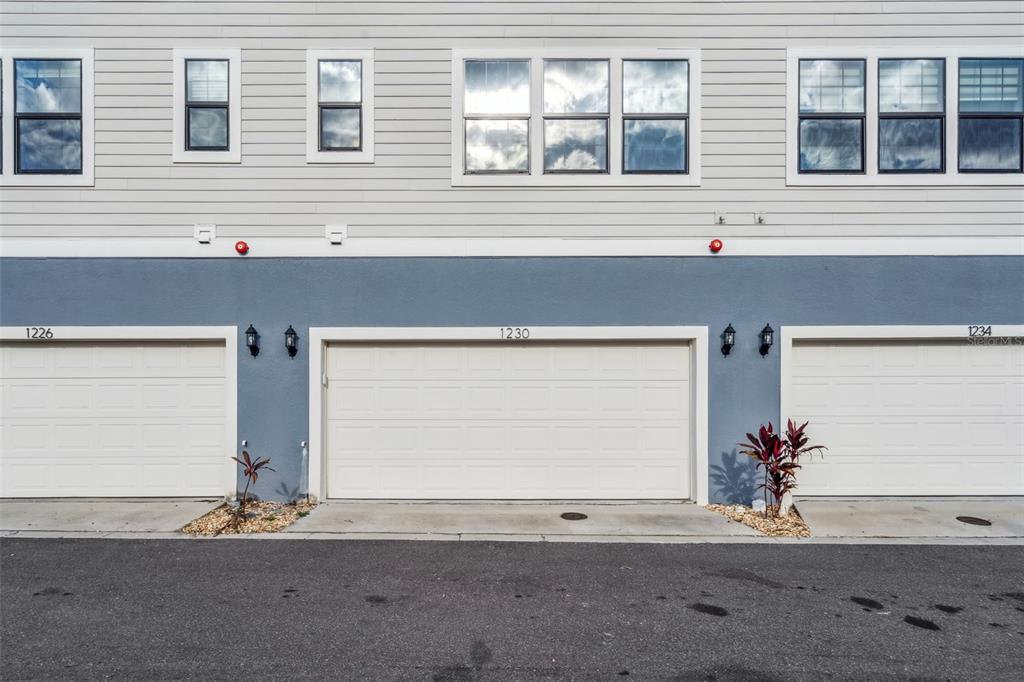 1230 Spotted Sandpiper Loop Winter Springs, FL 32708 - Photo 45 of 52 a front view of a house with a yard and garage