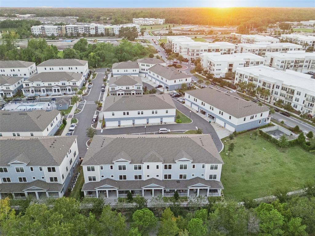 1230 Spotted Sandpiper Loop Winter Springs, FL 32708 - Photo 48 of 52 an aerial view of residential houses with outdoor space