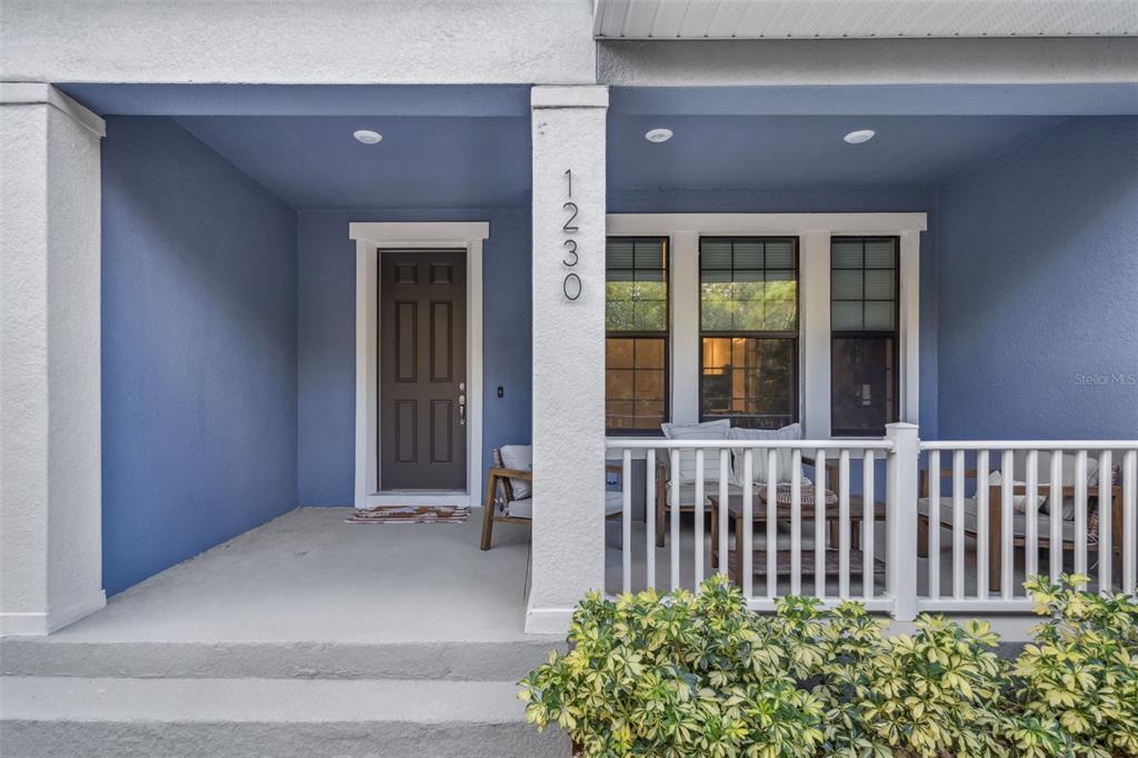 1230 Spotted Sandpiper Loop Winter Springs, FL 32708 - Photo 52 of 52 a view of a house with porch and wooden floor