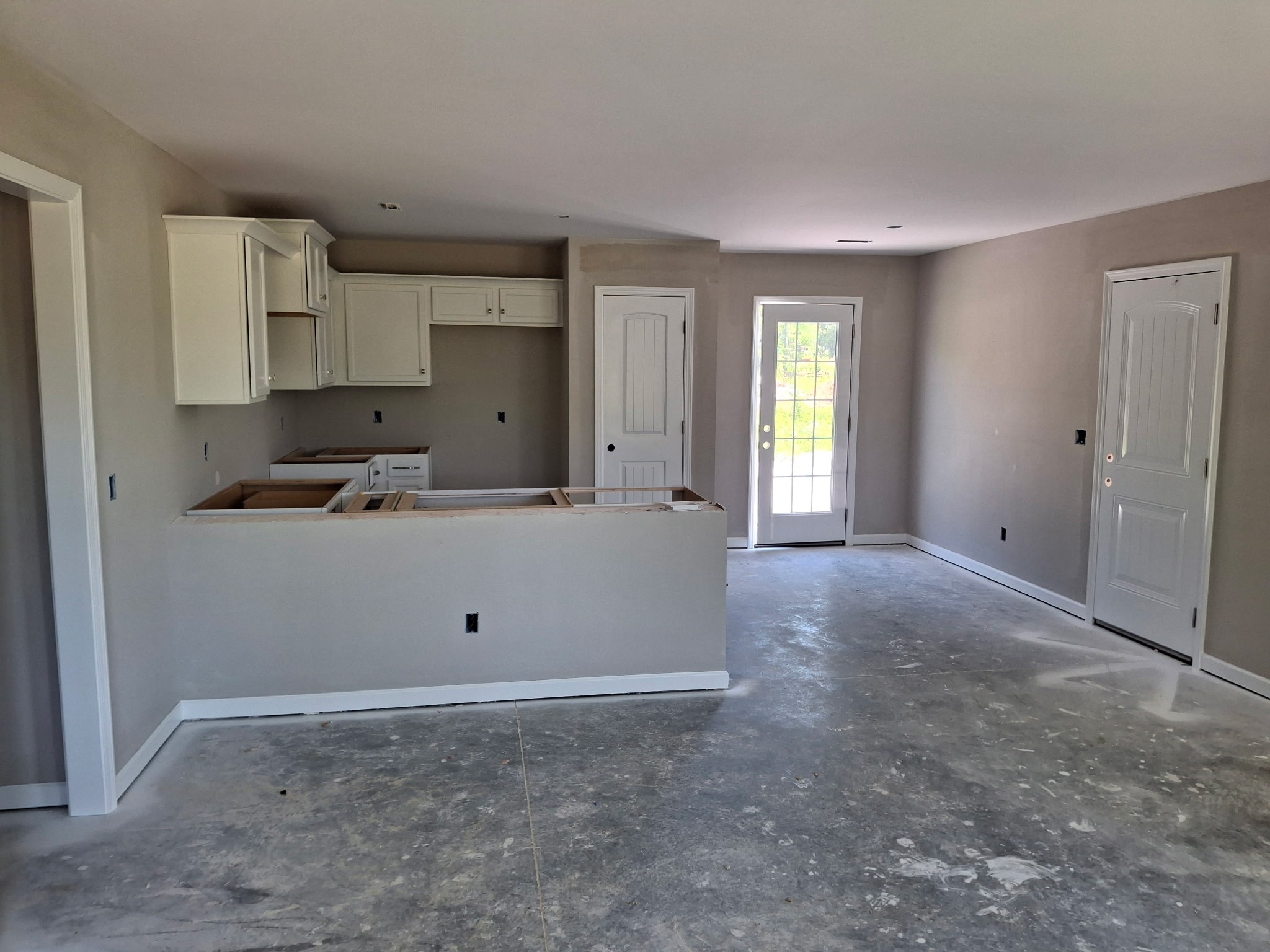 0 Old Brick Church Road Estill Springs, TN 37330 - Photo 2 of 11 a kitchen with stainless steel appliances granite countertop a sink stove and cabinets