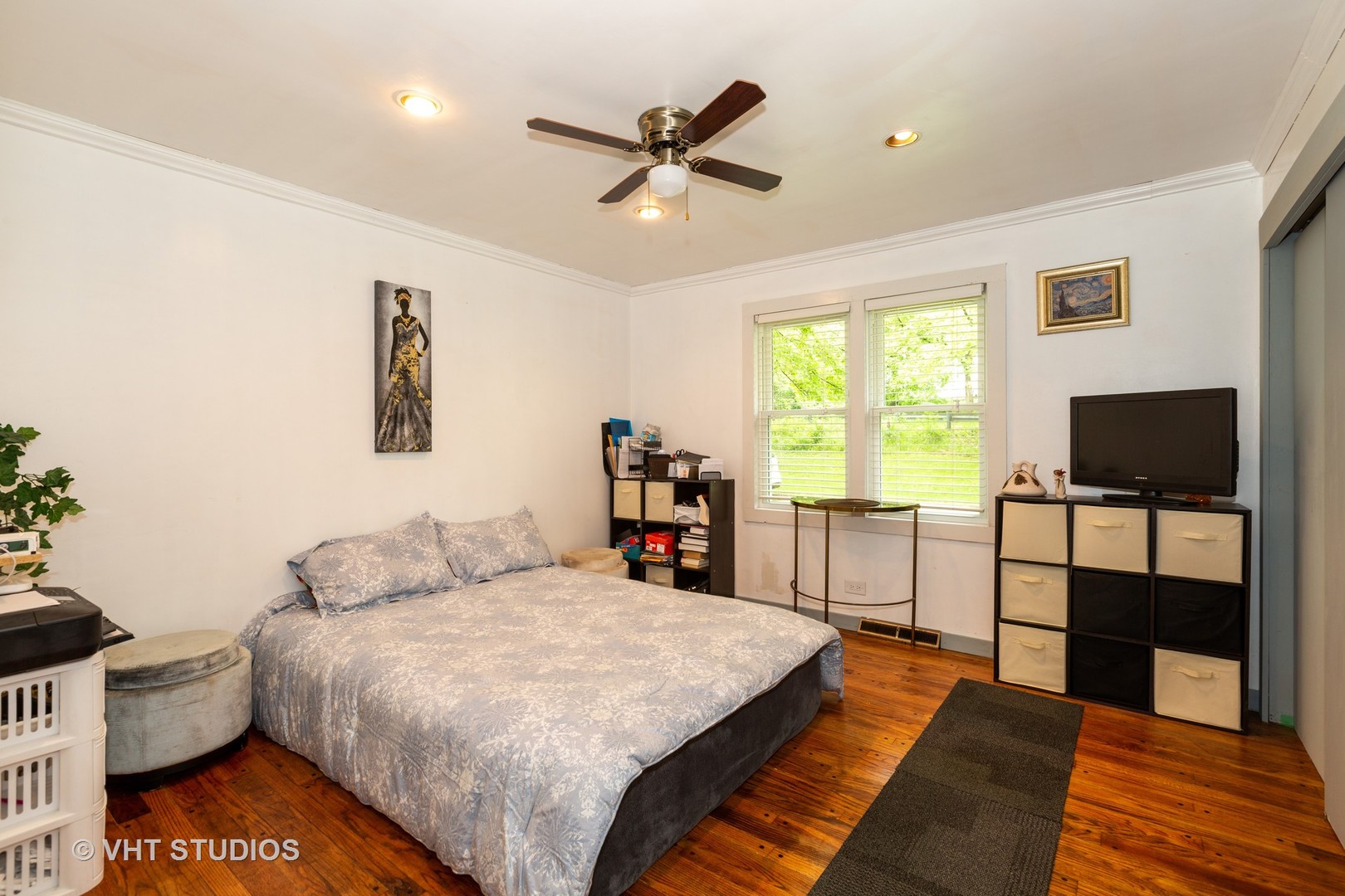 1560 Algonquin Road Fox River Grove, IL 60021 - Photo 8 of 12 a bed room with a bed and a television