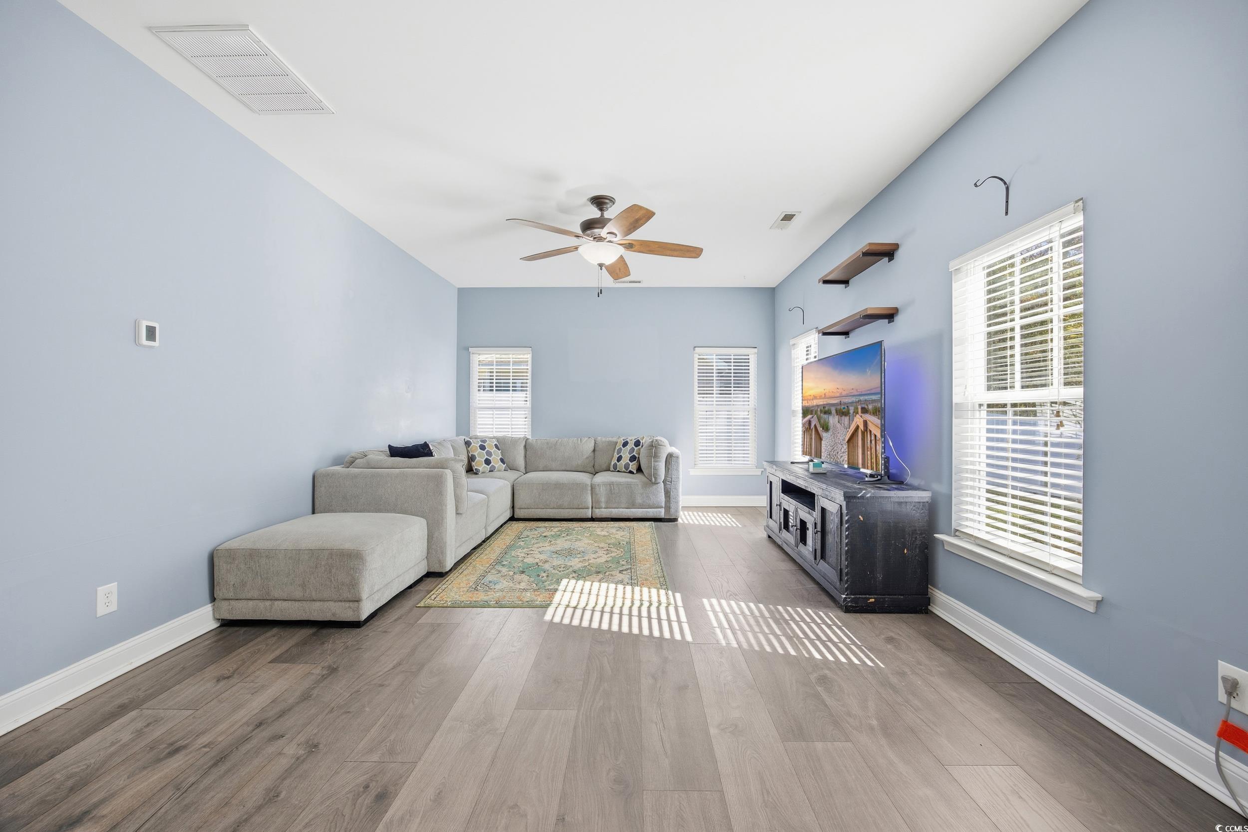 1112 Pine Ridge Street Conway, SC 29527 - Photo 3 of 40 Living area with wood finished floors and ceiling fan