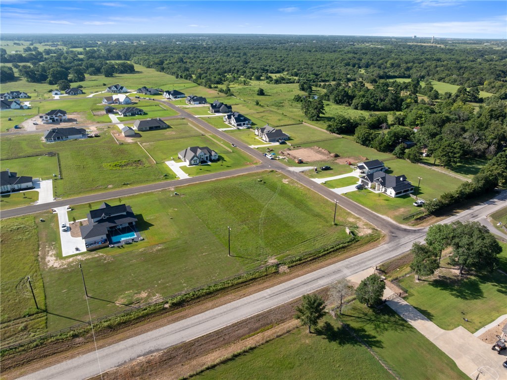 7801 Mathis Crk Drive Bryan, TX 77808 - Photo 5 of 12 a view of a city