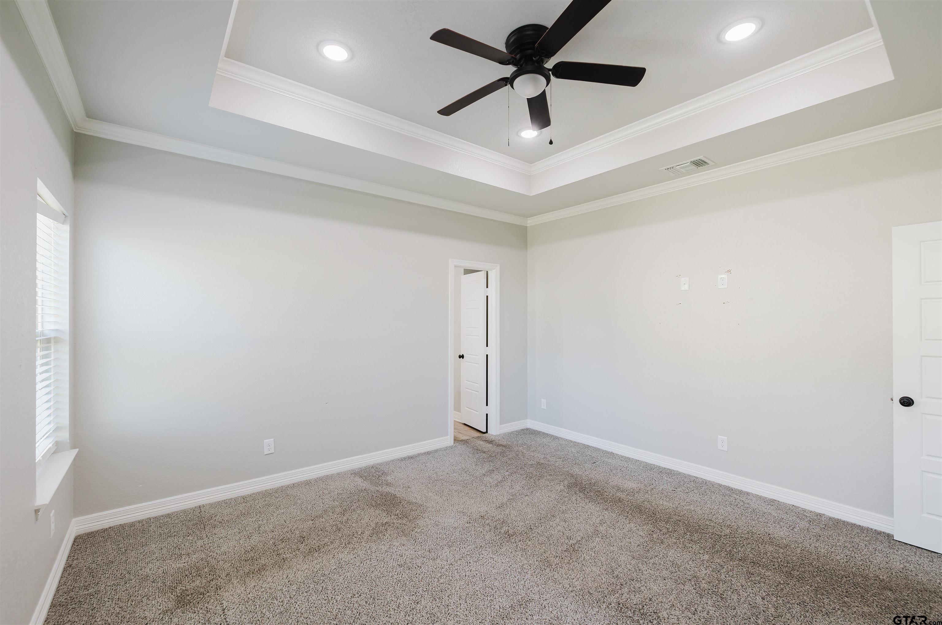 11051 Happy Acres Tyler, TX 75706 - Photo 21 of 36 an empty room with a ceiling fan and ceiling fan