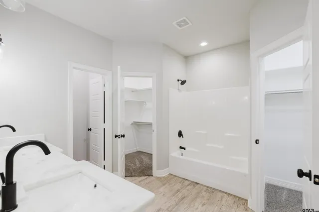 a bathroom with a bathtub