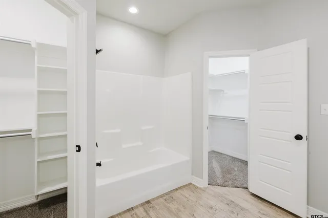 a view of small space with racks on the wall