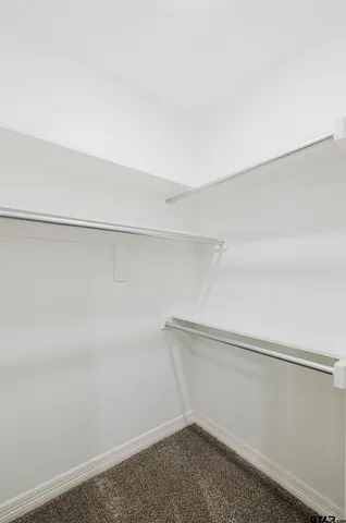 a bathroom with 2 sink and a mirror