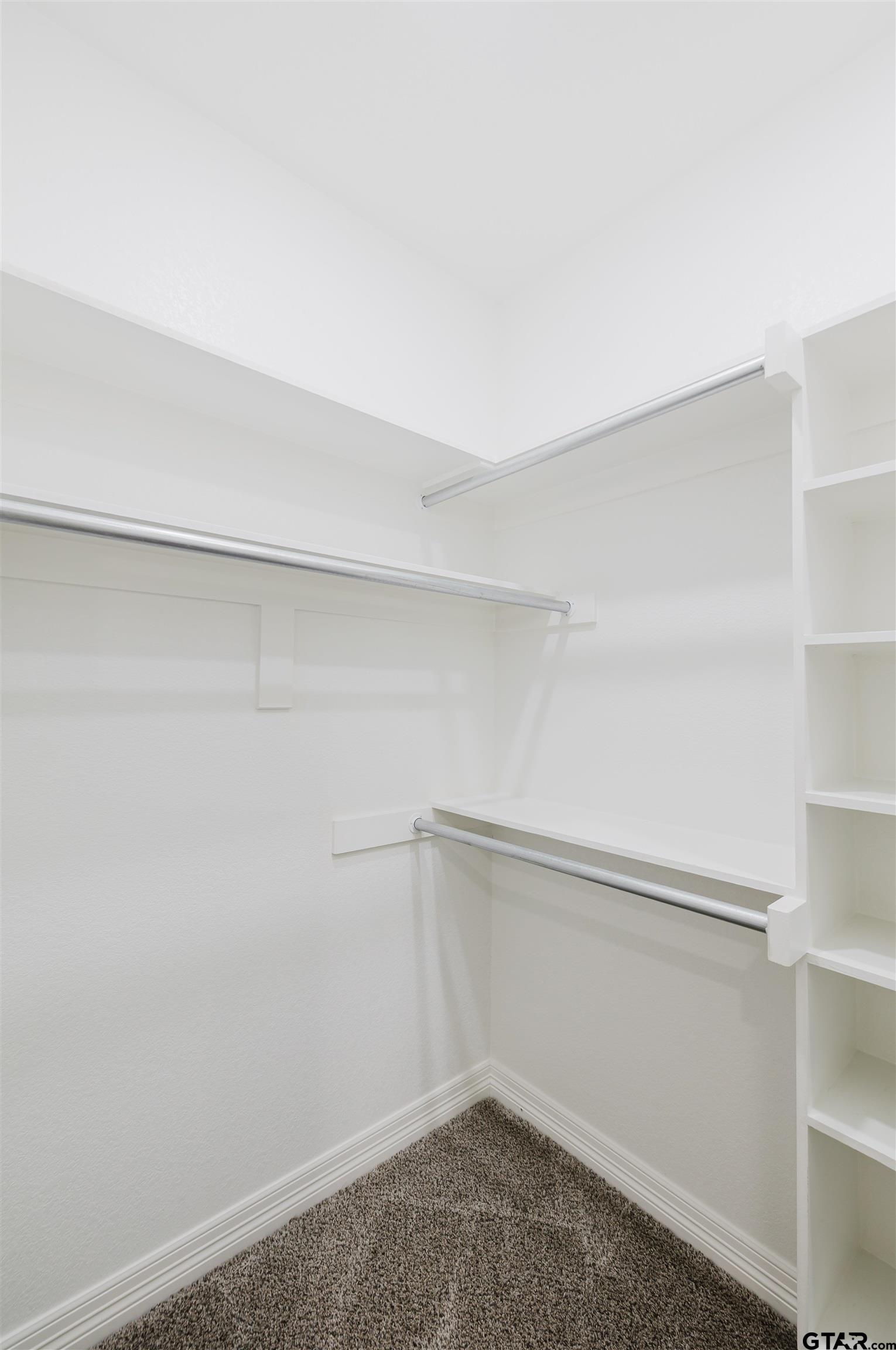 11051 Happy Acres Tyler, TX 75706 - Photo 26 of 36 a view of an empty walk in closet