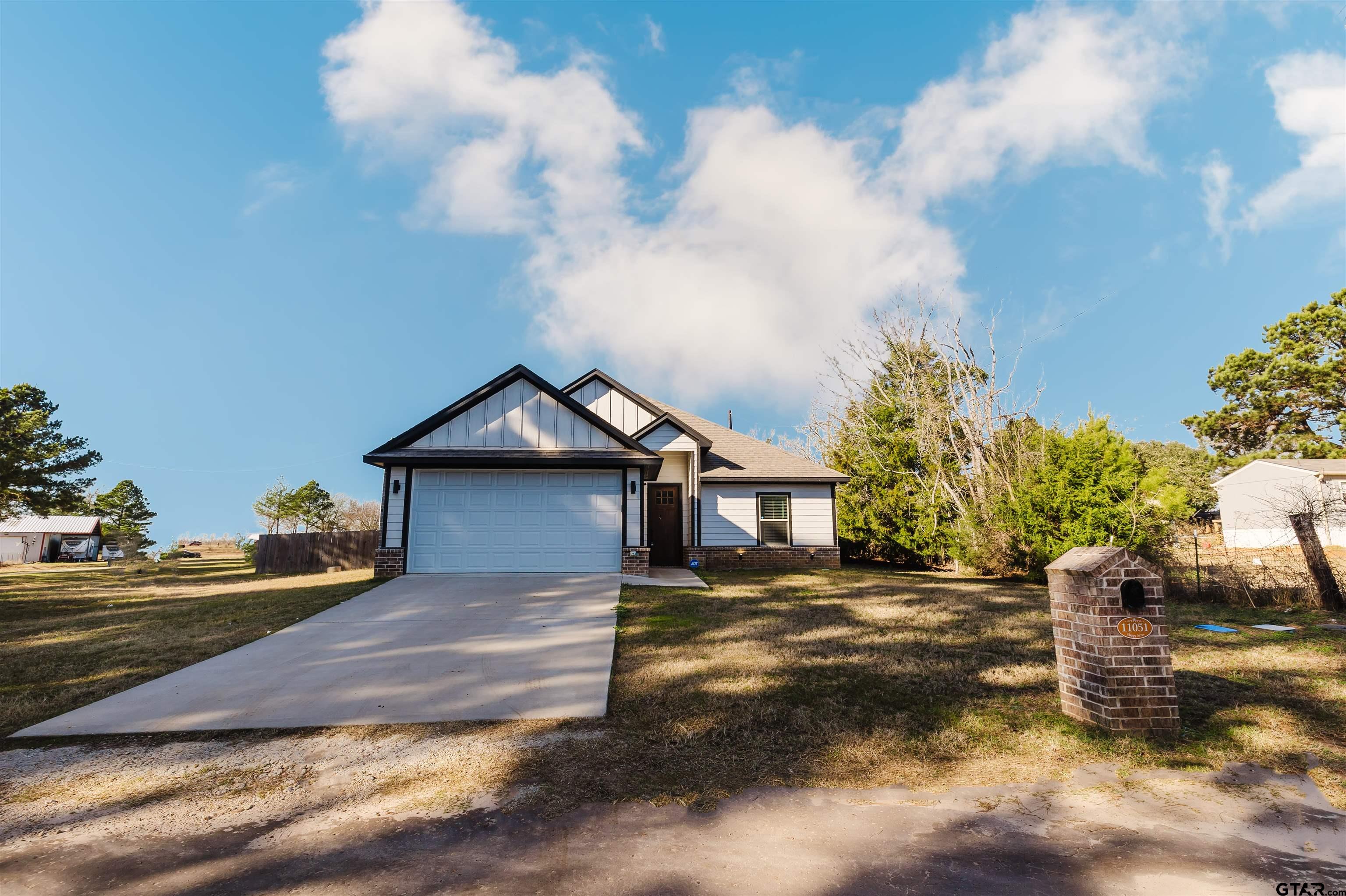 11051 Happy Acres Tyler, TX 75706 - Photo 3 of 36 a view of a house with a yard