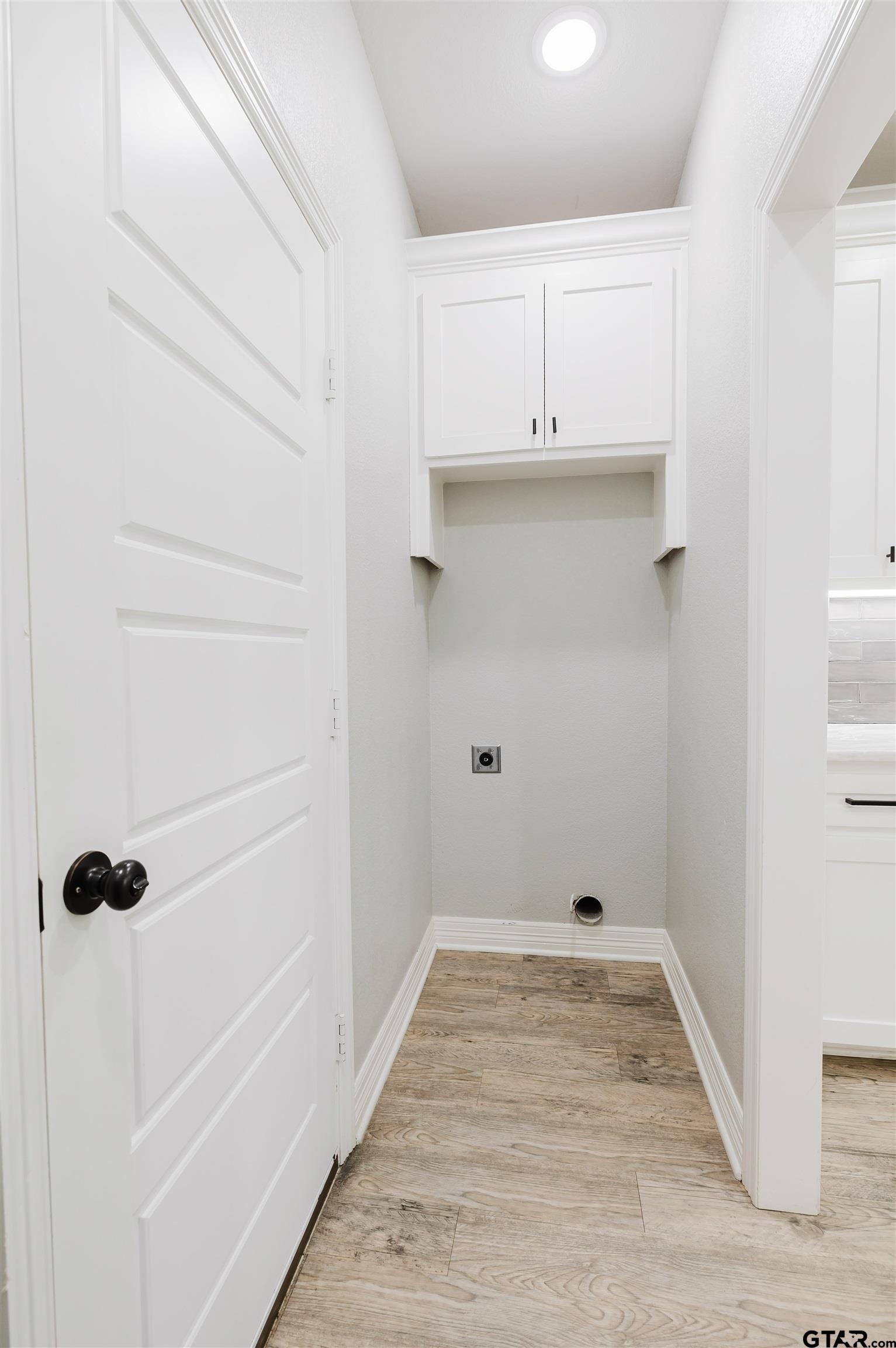 11051 Happy Acres Tyler, TX 75706 - Photo 33 of 36 a view of a kitchen with white cabinets