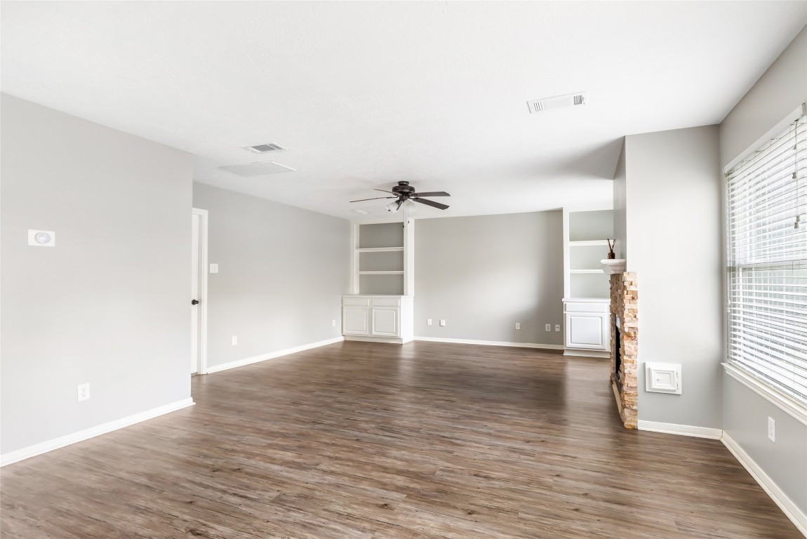 31315 Copperleaf Drive Spring, TX 77386 - Photo 12 of 34 a view of empty room with wooden floor and window