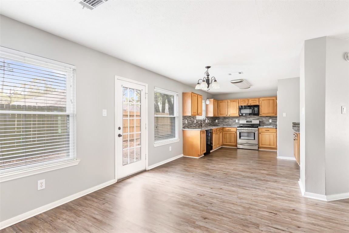 31315 Copperleaf Drive Spring, TX 77386 - Photo 15 of 34 a view of kitchen with wooden floor