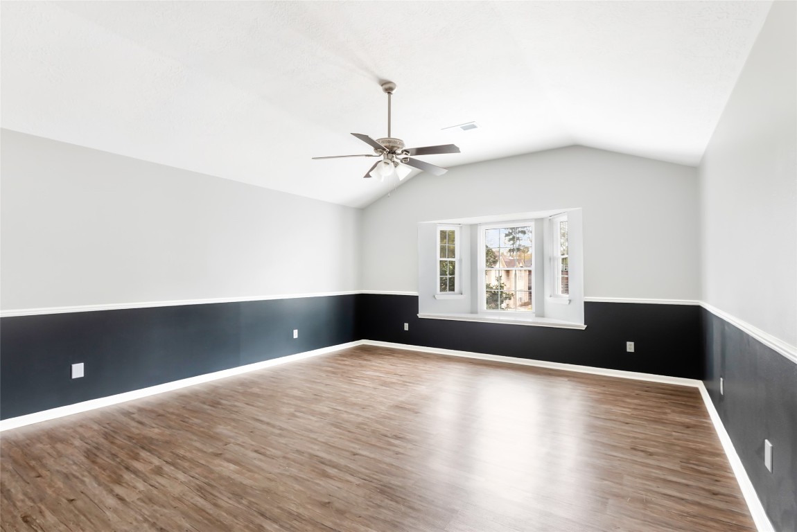31315 Copperleaf Drive Spring, TX 77386 - Photo 21 of 34 a view of an empty room with window and wooden floor
