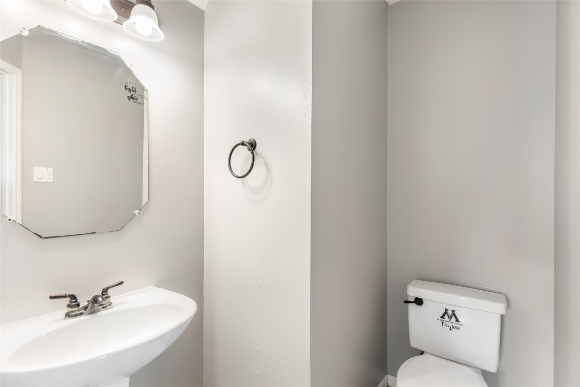 31315 Copperleaf Drive Spring, TX 77386 - Photo 10 of 34 a bathroom with a sink mirror and toilet