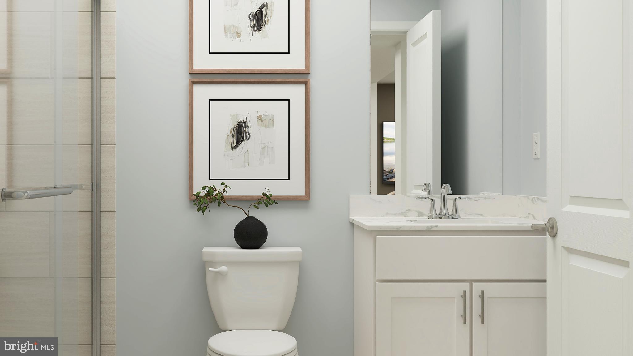 74 Bellan Drive Princeton, NJ 08540 - Photo 25 of 26 a bathroom with a toilet a sink and mirror