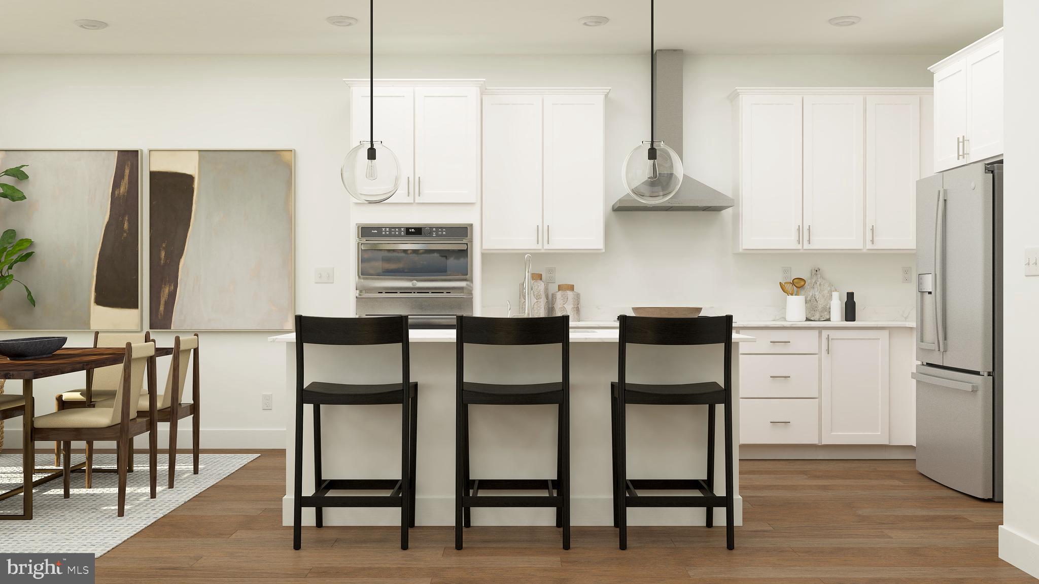 74 Bellan Drive Princeton, NJ 08540 - Photo 3 of 26 a kitchen with white cabinets and stainless steel appliances
