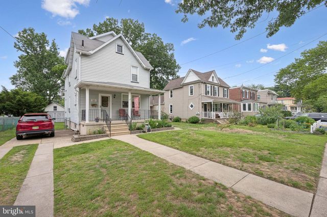 a view of house and outdoor space with yard