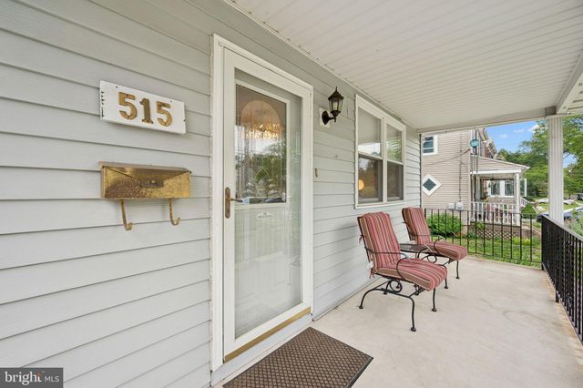 a outdoor space with a couch and chairs