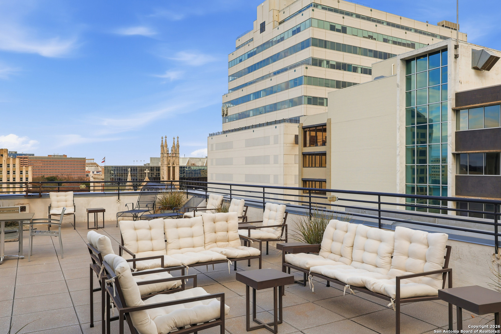 800 Brazos Street, Unit 1103 Austin, TX 78701 - Photo 19 of 26 a view of a roof deck with couches and potted plants