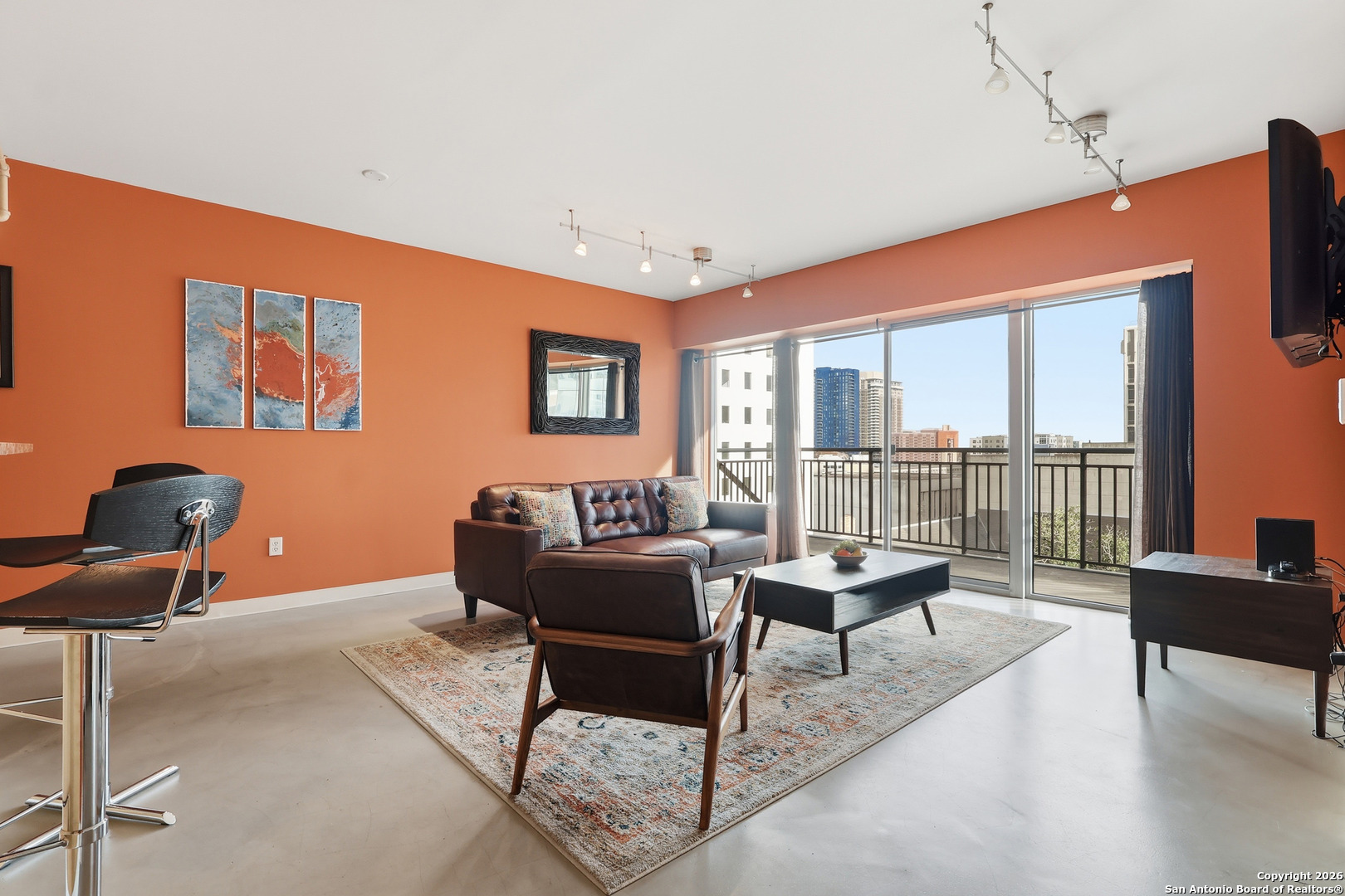 800 Brazos Street, Unit 1103 Austin, TX 78701 - Photo 2 of 26 a living room with furniture and floor to ceiling window