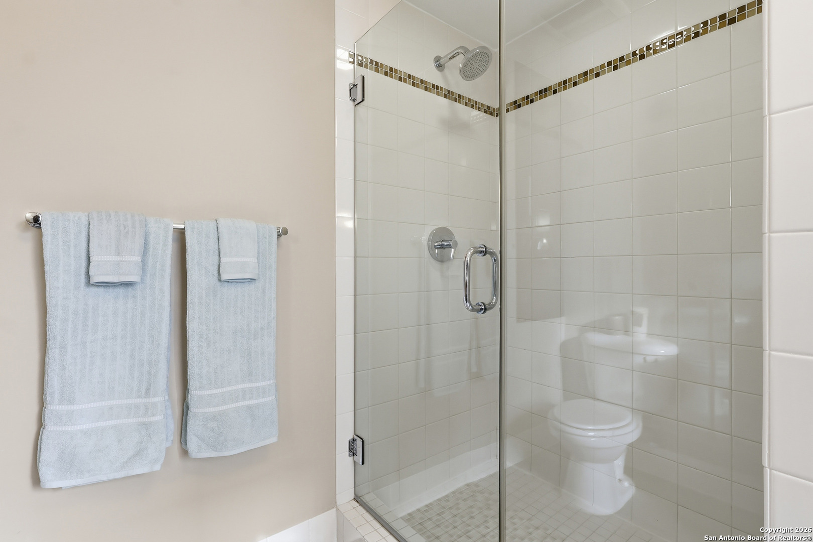 800 Brazos Street, Unit 1103 Austin, TX 78701 - Photo 6 of 26 a bathroom with a shower and toilet
