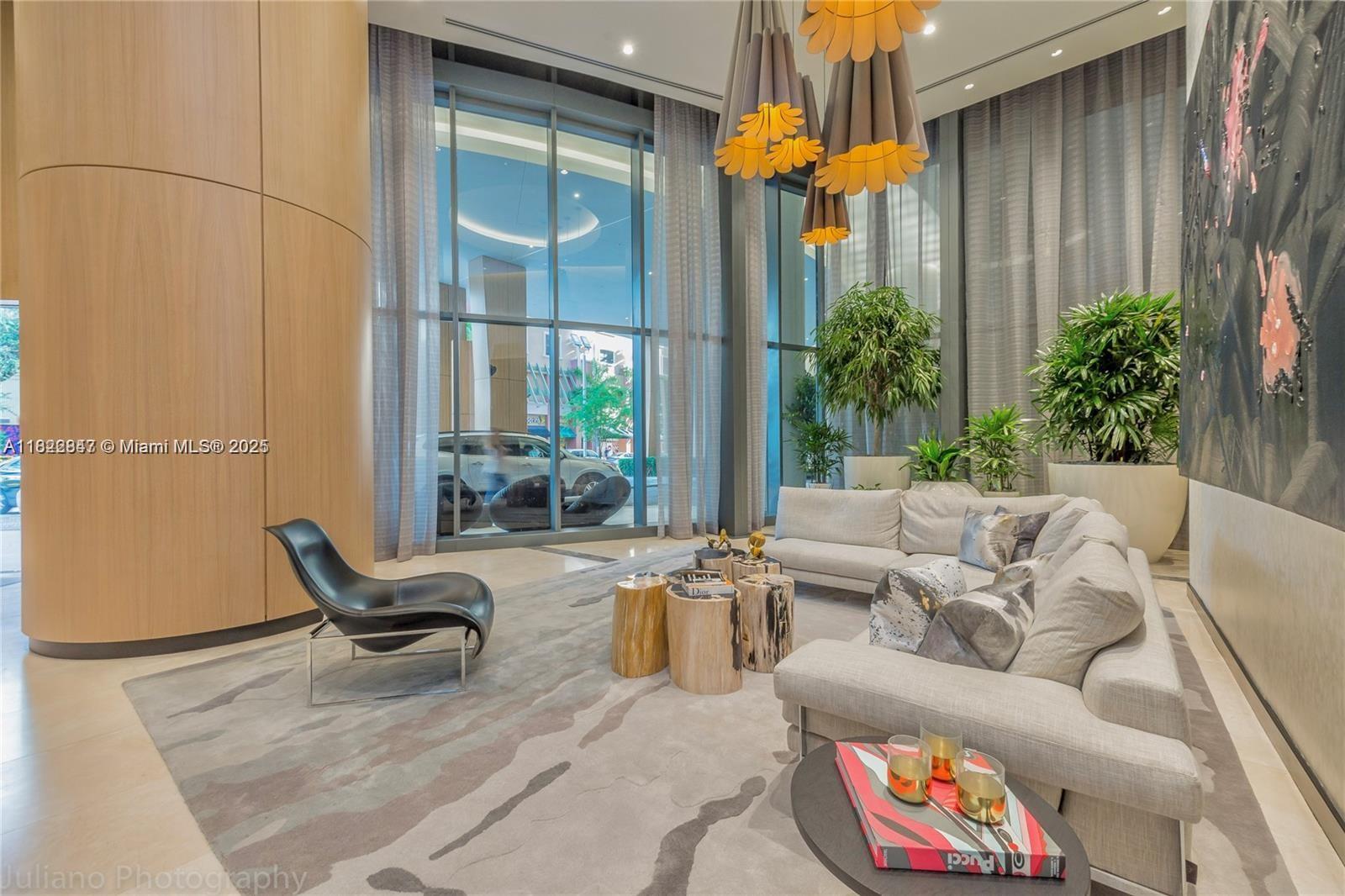 45 Southwest 9th Street, Unit 3403 Miami, FL 33130 - Photo 14 of 27 a living room with furniture and a potted plant