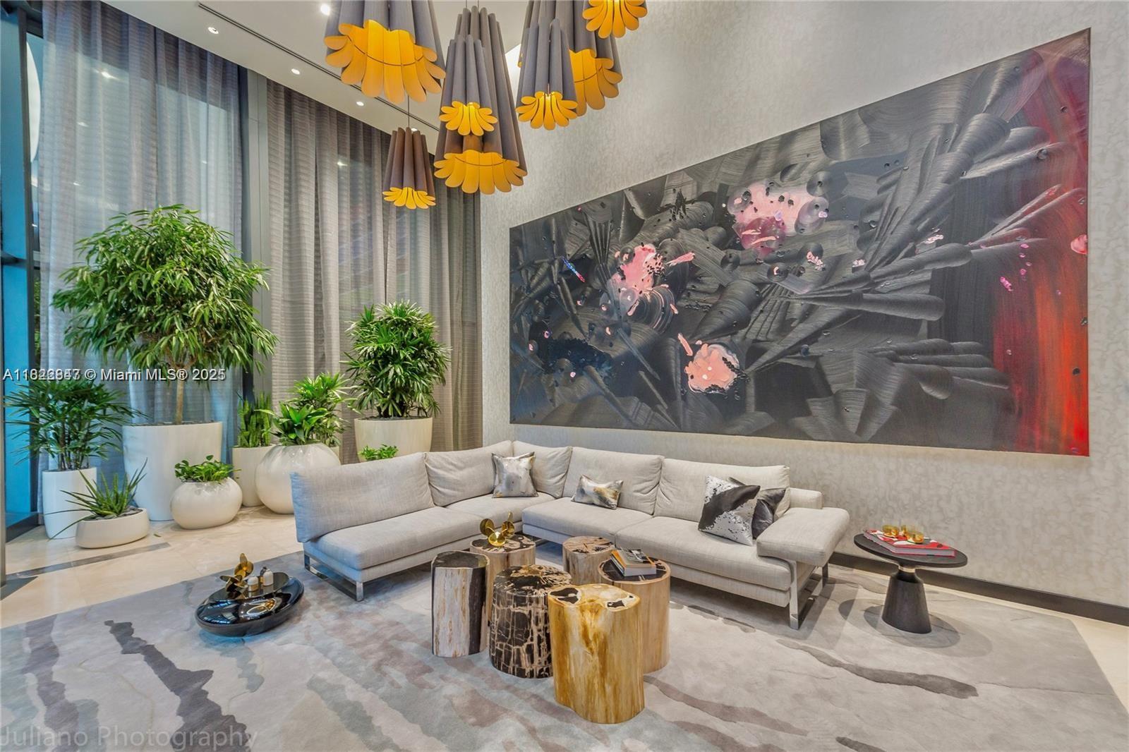 45 Southwest 9th Street, Unit 3403 Miami, FL 33130 - Photo 15 of 27 a outdoor living room with furniture and flowers