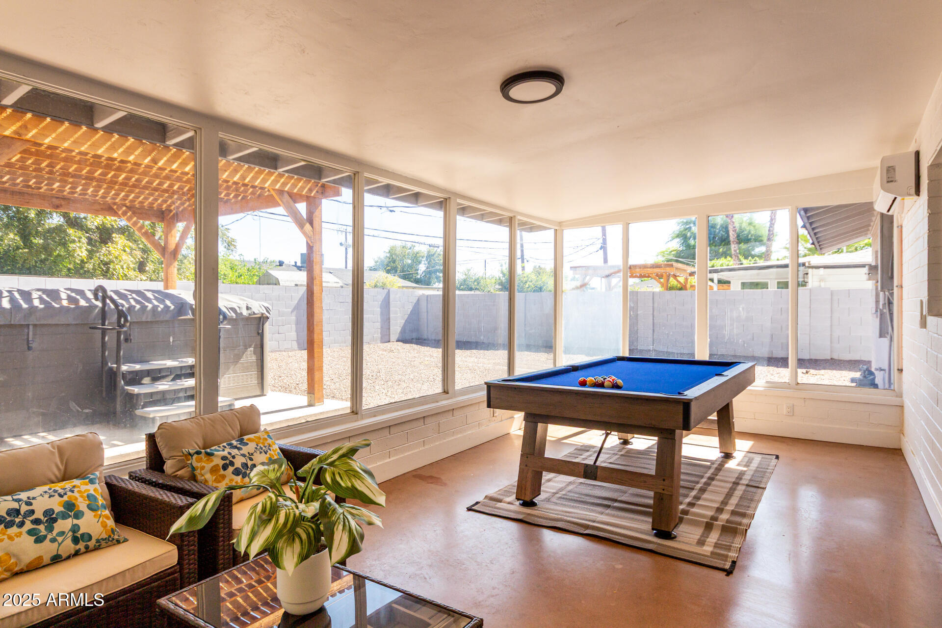 4735 North 24th Street Phoenix, AZ 85016 - Photo 25 of 44 a living room with furniture a rug and a large window