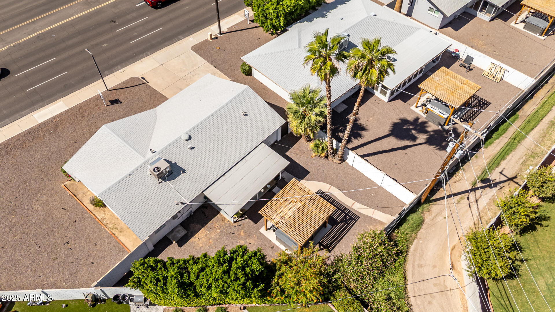 4735 North 24th Street Phoenix, AZ 85016 - Photo 39 of 44 an aerial view of a house with a swimming pool