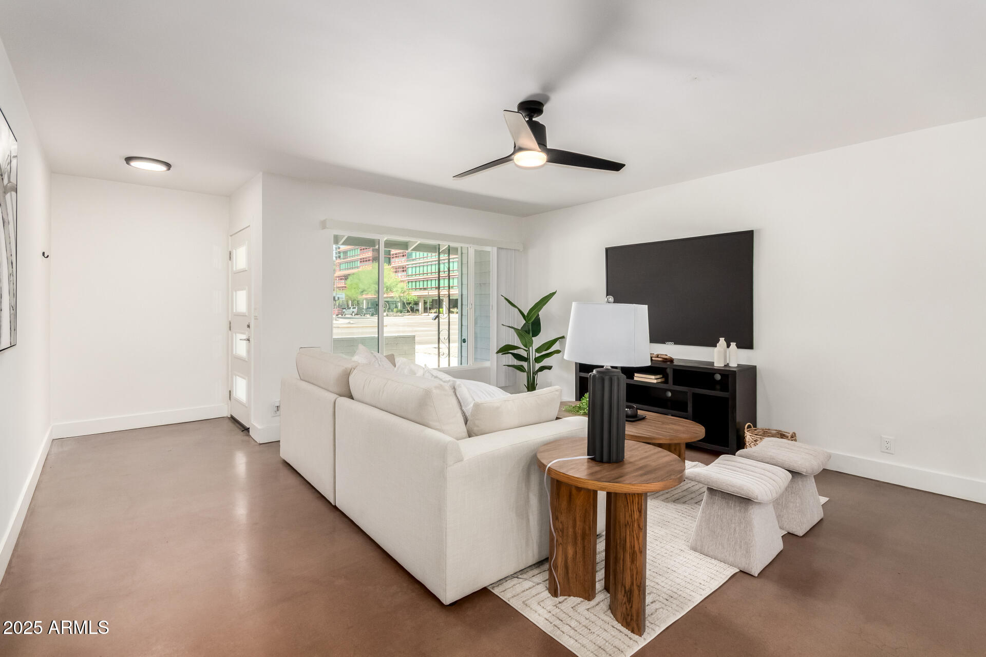 4735 North 24th Street Phoenix, AZ 85016 - Photo 6 of 44 a living room with furniture and a flat screen tv