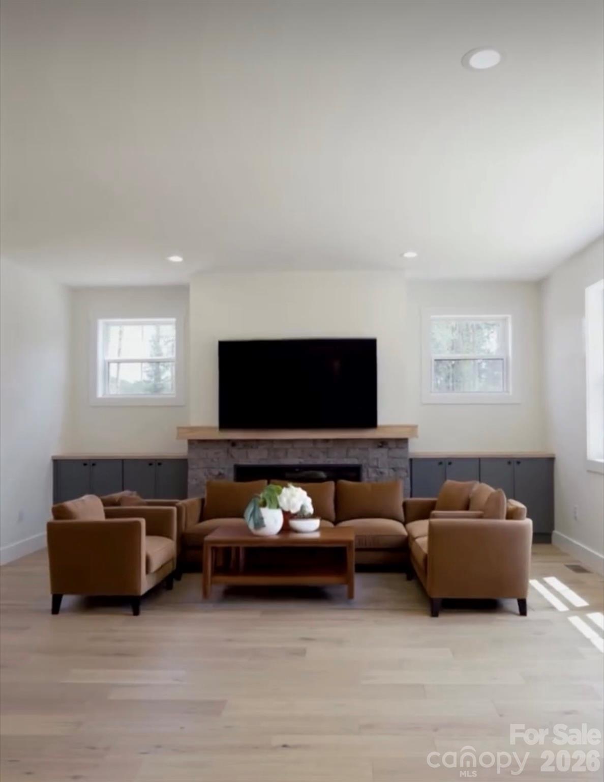 7501 Church Road Taylorsville, NC 28681 - Photo 4 of 17 a living room with furniture and a flat screen tv