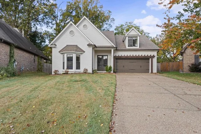 a view of house with a outdoor space