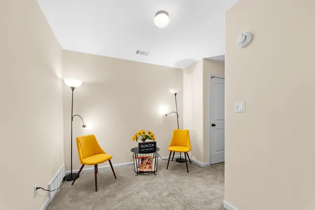 a view of a room with table and chair