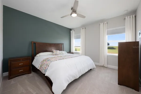 a view of storage and utility room with washer and dryer