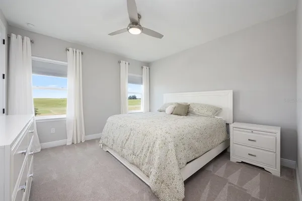 a aerial view of a house with a garden and swimming pool