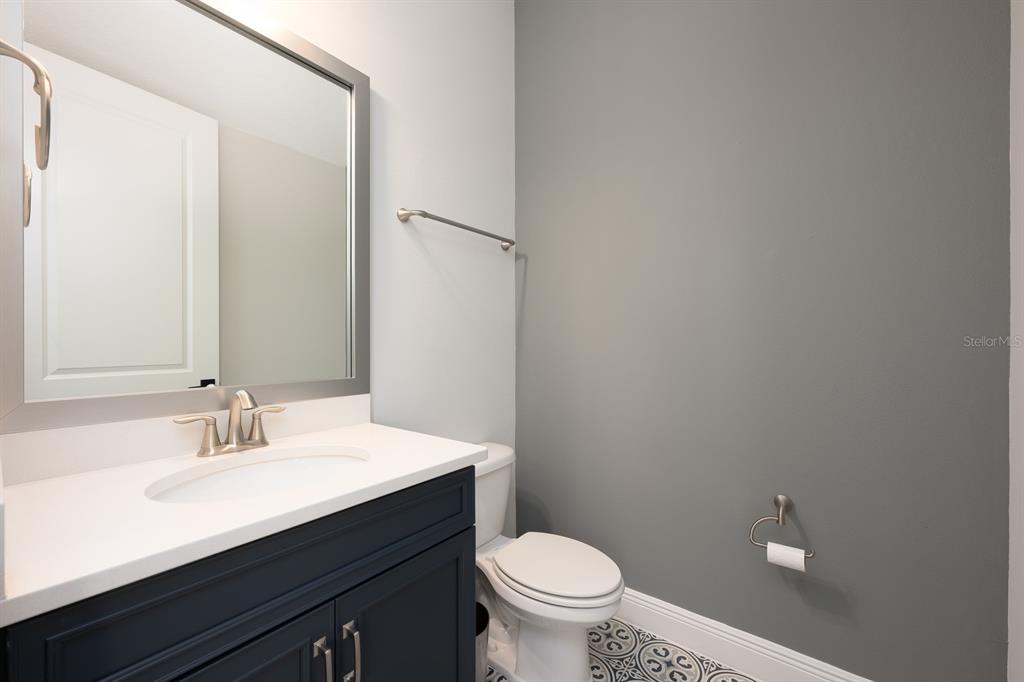 15714 Vetta Drive Montverde, FL 34756 - Photo 28 of 45 a bathroom with a sink and a toilet