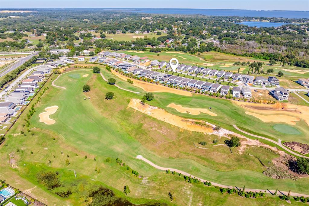 15714 Vetta Drive Montverde, FL 34756 - Photo 5 of 45 an aerial view of residential houses with outdoor space