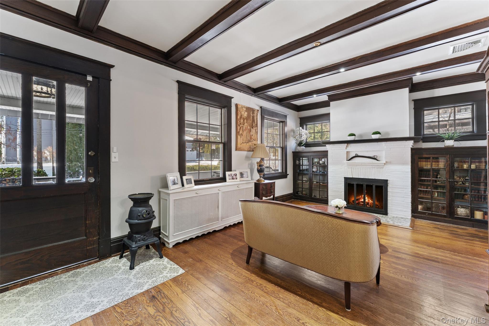 12 Swarthmore Road Scarsdale, NY 10583 - Photo 8 of 34 Living Room with Beautiful Built Ins and Fireplace