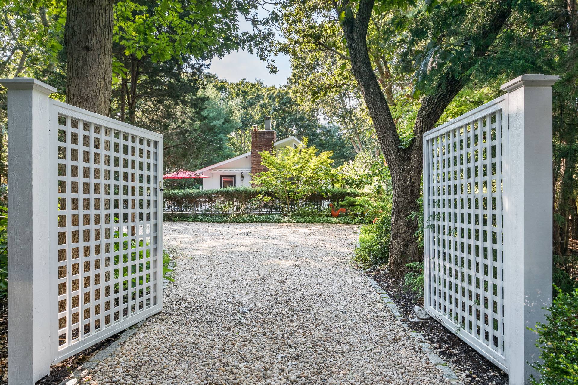 102 Rutland Road East Hampton, NY 11937 - Photo 20 of 20 a city view with tall trees