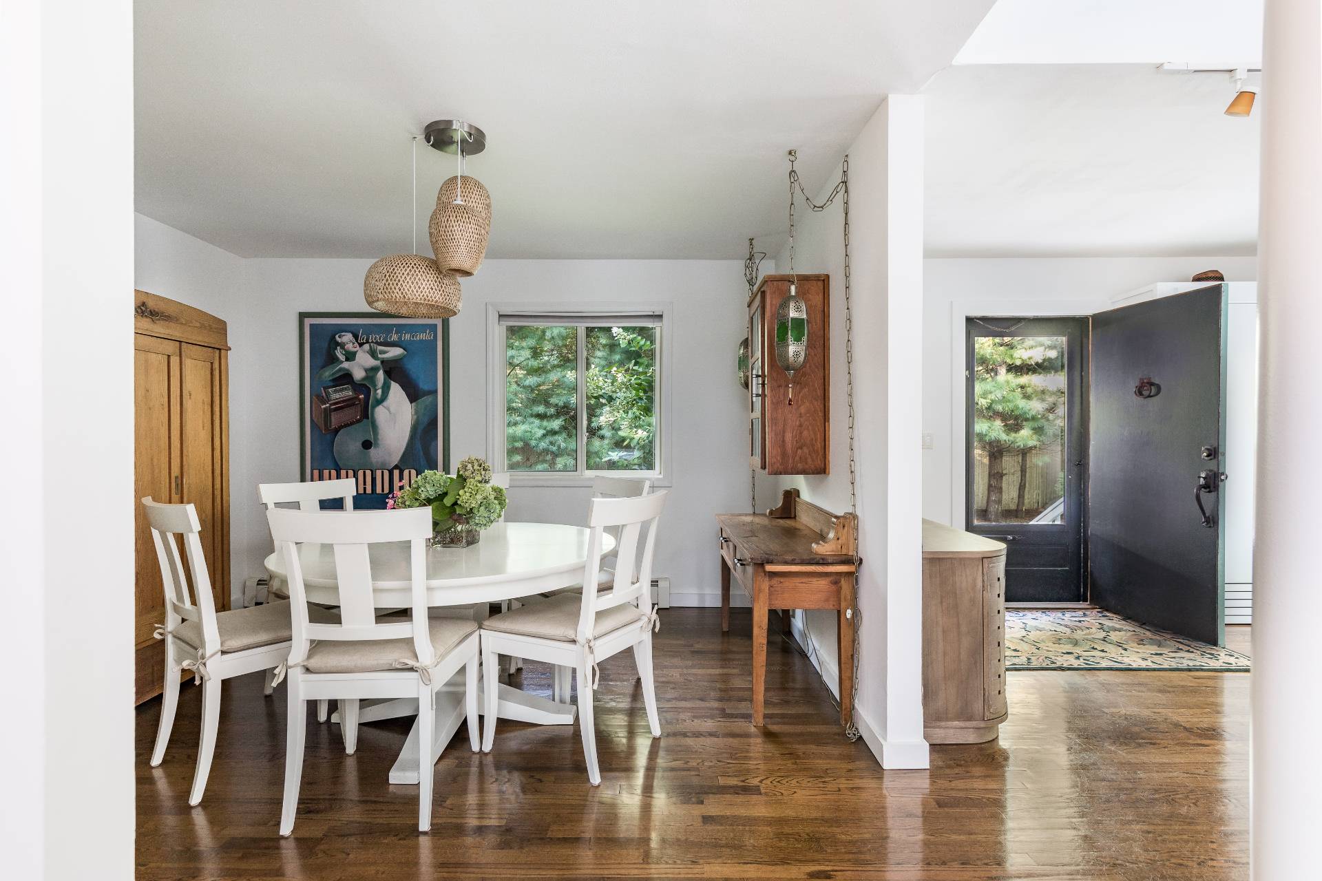 102 Rutland Road East Hampton, NY 11937 - Photo 4 of 20 a view of a dining room with furniture window and wooden floor