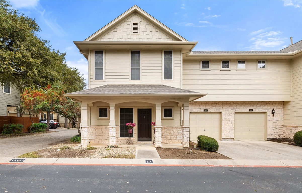 11000 Anderson Mill Road, Unit 17 Austin, TX 78750 - Photo 1 of 1 a front view of a house with a yard